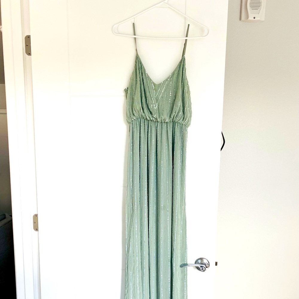 Medium sage green showmeyourmumu dress. Unaltered.  Beading intact.